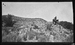 Man riding a horse in southeast Utah